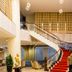 Muong Thanh Luxury Lang Son Hotel lobby with grand staircase and red carpet, Lang Son