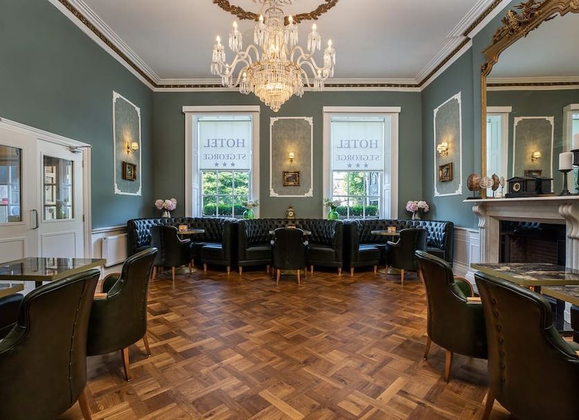 Hotel St George by Nina in Dublin elegant lounge with chandelier, parquet floors, and windows