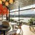 Vivanti Resort in Guatapé lounge with panoramic lake and mountain views through floor-to-ceiling windows