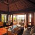 The Menjangan by LifestyleRetreats villa interior with open deck and forest view in Gerokgak