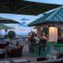 Treasure Island Hotel and Marina rooftop bar with ocean view at sunset in Treasure Island