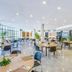 Melia Habana in Havana restaurant with bright dining area, large windows and modern tables