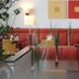 Livenwork Hotel & Coworking Gvz Ingolstadt lounge with red seating and modern decor in Ingolstadt