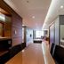 Oriens Hotel & Residences Myeongdong Seoul apartment dining area with kitchenette and city view