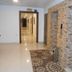 Seven Days Hotel, Irbid: elevator lobby with hallway and tiled walls