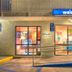 Motel 6 Mammoth Lakes exterior entrance with ramp and lit welcome sign in Mammoth Lakes