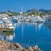 Sea of Cortez Beach Club in San Carlos overlooking a marina with yachts and calm blue water