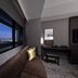 Hotel Villa Fontaine Grand Tokyo-Ariake room with city view, sofa, desk and large window overlooking Tokyo