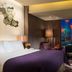 Four Seasons Hotel Shenzhen guest room with city skyline view at night