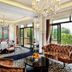Chateau Star River Beijing dining room with chandelier, plush sofa, and balcony garden view