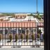 La Terra Dei Sogni Country Hotel in Taormina with balcony view over rooftops and the sea