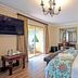 Sunward Park Guest House & Conference Centre in Boksburg bedroom with sliding doors to a patio