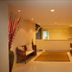 Baan Klang Hua Hin lobby with wicker seating, decorative vases, and recessed lighting in Hua Hin