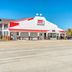 OYO Hotel Waco University Area/ I-35 exterior in Waco with parking lot and clear blue sky