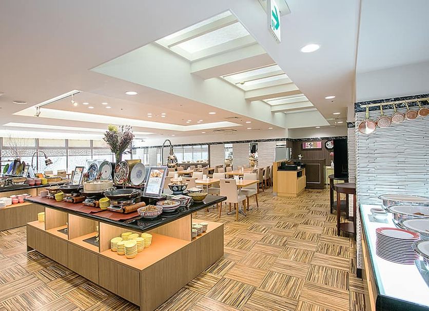 Hotel Hokke Club Fukuoka breakfast buffet dining area in Fukuoka with skylights and buffet stations