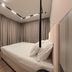 Hotel Aquarius Dubrovnik room with double bed, desk, TV and floor-to-ceiling curtains in Dubrovnik