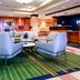 Fairfield Inn & Suites by Marriott Indianapolis Noblesville lobby seating area with reception desk
