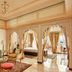 Taj Fateh Prakash Palace Udaipur room with arches, ornate seating and lake-view balcony