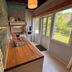 YXIE - manoir des arts in Villeblevin: bright kitchenette with wood countertop and garden-facing windows