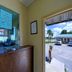 Star Inn in Karnes City lobby front desk with open doorway to parking lot