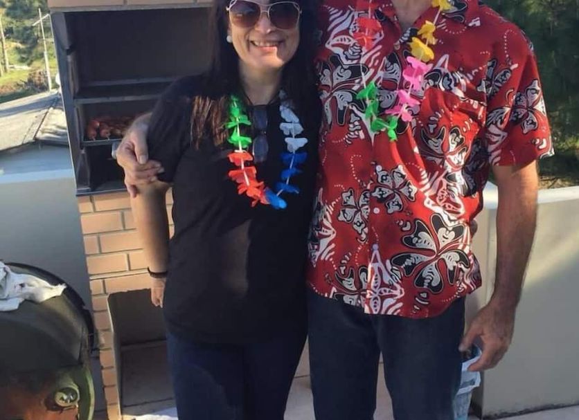 Guests posing with leis at Pousada Ilha Margarita in Florianopolis