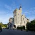 Mercure Aberdeen Ardoe House in Aberdeen, a stone castle-style hotel with turrets and arched entrance