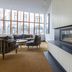 Hotel Noreg, Ålesund lobby lounge with fireplace and city-view windows