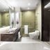 R Hotel Rancamaya Bogor bathroom with soaking tub, walk-in shower, and modern vanity