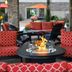 Berlin Grande Hotel in Berlin features a cozy outdoor fire pit seating area with red patterned chairs.