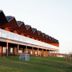 Iron Creek Bay Estate in Sorell, modern lodge-style hotel with zigzag roofline and grassy grounds