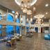 Blue Marine Resort & Spa in Agios Nikolaos lobby with sea views, hanging lights, and seating area