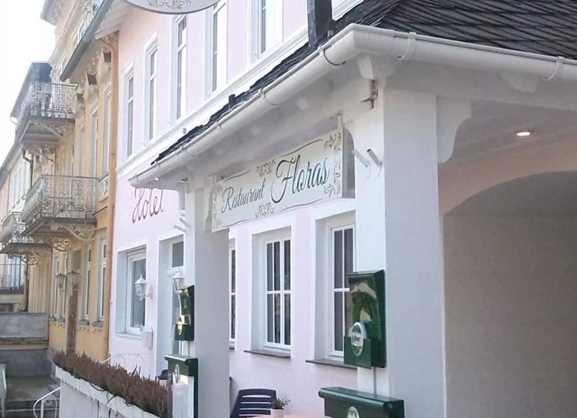 Hotel Victoria in Schlangenbad exterior with white facade and covered entrance