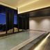 MGH Mitsui Garden Hotel Taipei Zhongxiao indoor pool with Taipei city skyline view at night