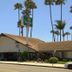 Vagabond Inn Ventura exterior with palm trees and roadside entrance in Ventura