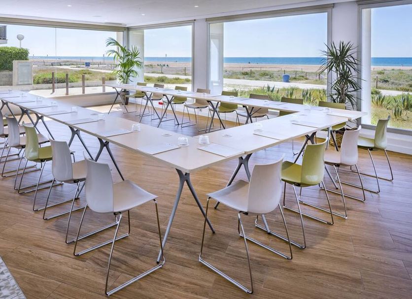Bel Air Castelldefels meeting room with tables, chairs and panoramic beach and sea views