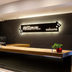 Stay Inn Taipei City reception desk with illuminated welcome sign and check-in counter