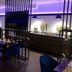Hotel Ramor Garni in Duisburg dining area with tables, blue chairs, and buffet counter