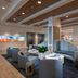 SpringHill Suites by Marriott Navarre Oceanfront lobby seating area with curved sofa and retail area
