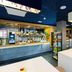 Ibis Budget Manosque Cadarache breakfast area with buffet counter and white tables in Manosque