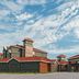 La Quinta Inn & Suites by Wyndham Fort Worth City View exterior with red roofs and covered entrance