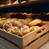 Holiday Inn Express Nürnberg-Schwabach breakfast buffet with fresh bread and pastries in wooden crates