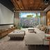 Rosewood Mayakoba in Playa del Carmen living room with sectional sofa and large garden-view window