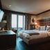 Hotel Bristol Verbier room in Bagnes with plaid headboard, king bed, balcony doors and warm lighting