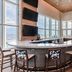 Hampton Inn & Suites Panama City Beach-Beachfront lobby bar with ocean views and high-top seating