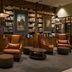 The Lincoln Marriott Cornhusker Hotel library-style lounge in Lincoln with leather chairs and bookshelves