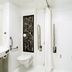 Accessible bathroom at ibis London Barking in Barking with toilet, sink and roll-in shower