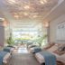 Cliff House Maine in Cape Neddick spa lounge with lounge chairs and ocean-view windows