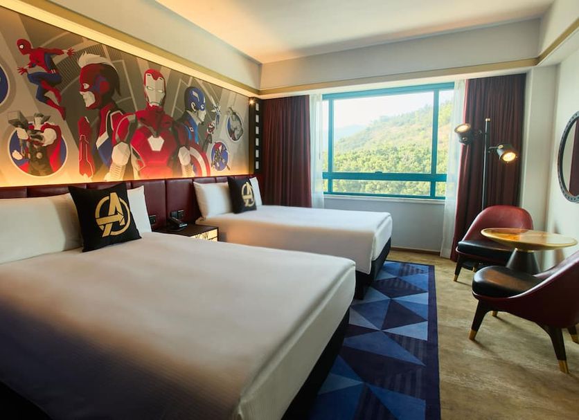 Disney's Hollywood Hotel Hong Kong twin room with Avengers art and mountain view