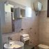 Agriturismo Serafina in Otranto bathroom with vessel sink, toilet, bidet, and wall-mounted water heater