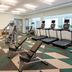 Element Ontario Rancho Cucamonga fitness center with treadmills, weights, and exercise benches